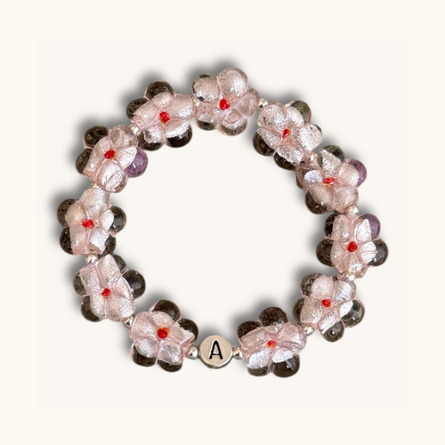Armband mit Bluetenperlen aus Glas und Buchstabenperlen aus 925 Silber